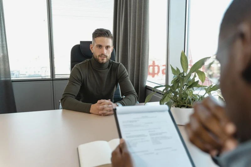 Interview in progress between a candidate and a consultant